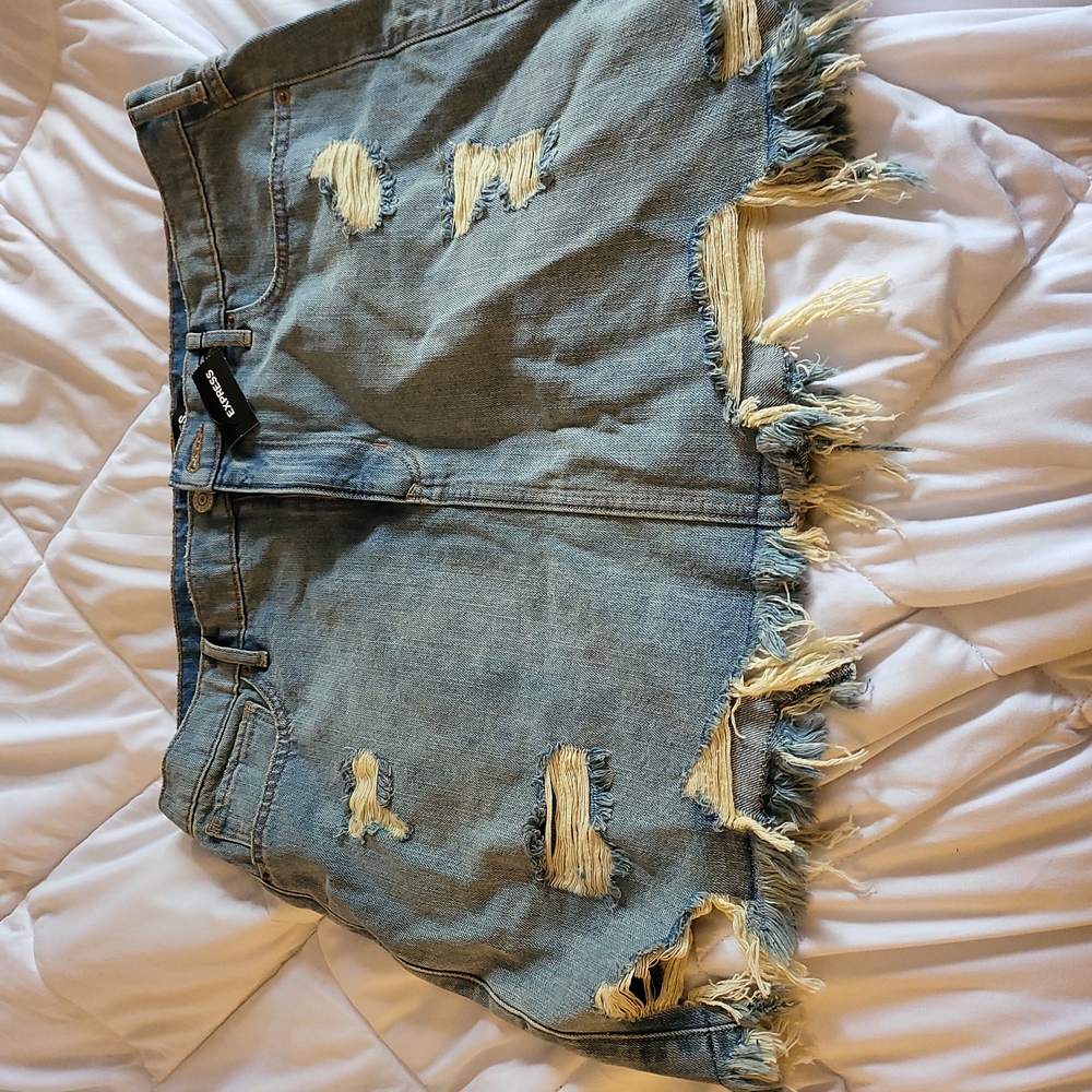 Express medium blue jean color distressed skirt size 16 new